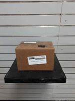 Sealed brown box with Polaris K-Dash winch switch label visible