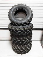 Stack of four Carlisle ACT tires