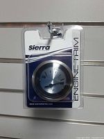 Front view of sealed Sierra engine trim gauge package