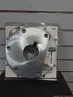 Front view of packaged Springfield aluminum deck base