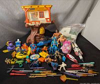 Full lot overview with playset, figures, vehicles, plush, accessories