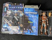 Both figures side by side, Worf carded, Phlox boxed with tray removed