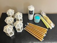 overview of five lanterns and assorted candles