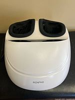 Top view of Renpho foot massager showing dual foot chambers