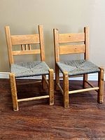 Front view of both small wood chairs showing overall design and size