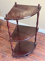 Full view of three-tier wooden corner shelf showing overall design and condition