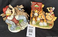 Both figurines side by side showing overall design and scale