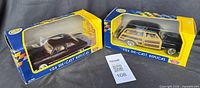 Both boxed Sun Star 1:24 models side by side