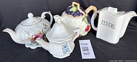 Group shot of four teapots showing overall designs and sizes