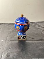 Full view of ceramic canister with lid on
