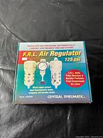 Front of retail box showing Central Pneumatic F.R.L. Air Regulator 125 psi graphics