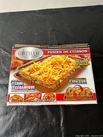 Front of boxed Gotham Steel crisper tray showing product image and branding