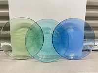 Front view of all three coloured plates side-by-side