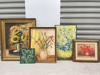 Group shot of all five framed floral paintings