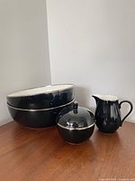 All four Mikasa Noir Platinum pieces grouped