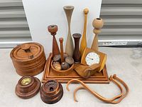 Group shot of entire wooden lot including ice bucket, candlesticks, cruet set, clock, coat hangers, bird box, mills, board