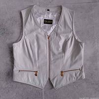 Front view of white leather vest