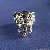 front view of silver-plated elephant head ring