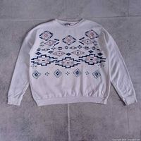 Full front view of sweatshirt showing pattern and overall condition