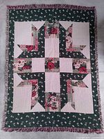 Full view of woven tapestry throw showing overall pattern, size proportions and fringe