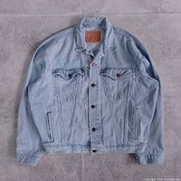Front view of Levi’s light-wash denim jacket