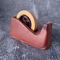 Right-front view showing overall shape and installed tape roll