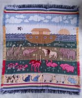 Full view of tapestry showing complete Noah’s Ark design and fringe