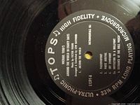 Tops label side A showing title and credits on vinyl