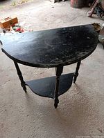 Full view of two-tier demi-lune table