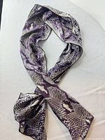 Full view of scarf laid out showing length and pattern