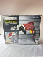 Front of retail box displaying Chicago Electric 1/2" variable speed reversible heavy duty drill