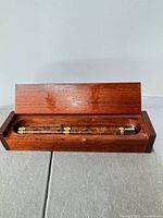 Pen in open wood presentation box