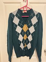 Front view showing argyle design, neckline, overall color