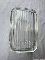 Top view of clear glass Pyrex rectangular dish with ridged lid