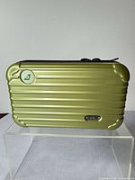 Front view of olive green Rimowa EVA Air toiletry case