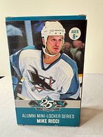 Front of unopened box displaying Mike Ricci image and 25th Anniversary Alumni Mini-Locker Series branding