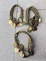 All three bracelets laid flat showing overall design