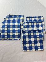 all six napkins laid out showing pattern and quantity