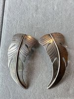 front view of both sterling silver leaf earrings