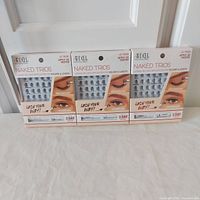 Front view showing three sealed Ardell Naked Trios boxes