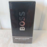 Front of sealed Boss Bottled Beyond box