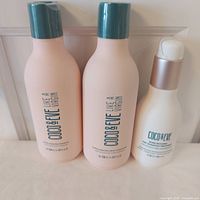 Front view of all three Coco & Eve bottles