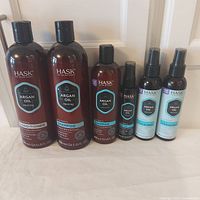 Front view of all six Hask Argan Oil products