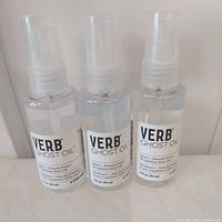Three Verb Ghost Oil bottles front view