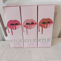 Front view of three boxed Kylie Jenner lip kits
