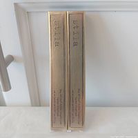 Front view of two sealed Stila liner boxes