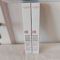 Front view of two boxed Clarins Wonder Volume XXL Mascaras