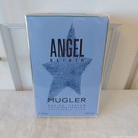 Front of sealed Mugler Angel Elixir 50 mL box