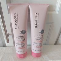 Front view of both Teaology Happy Body Slimming Balm tubes