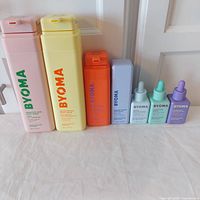 All seven Byoma products lined up showing packaging and relative sizes